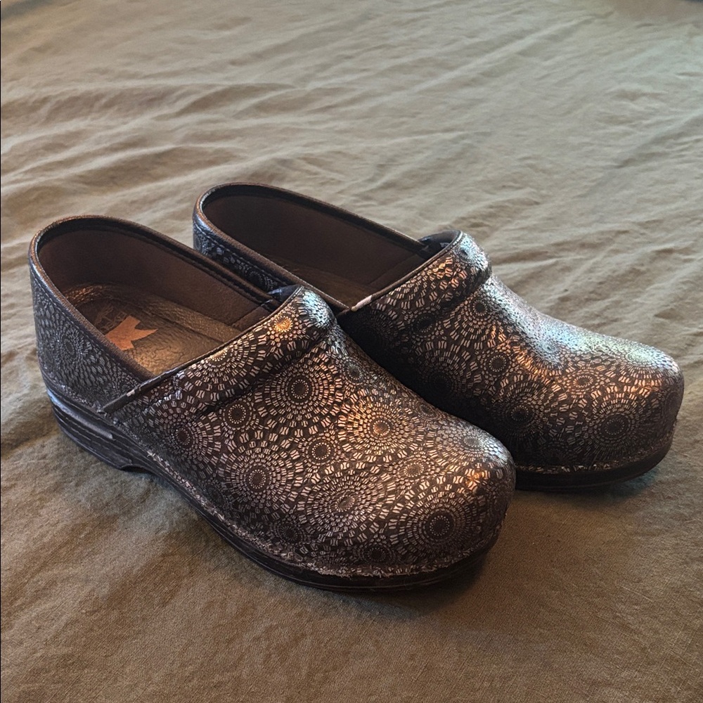 Dansko clogs, size 39, mild wear, silver and black.